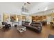 Spacious living room with tile floors and clear sightlines into the kitchen at 8424 Lake Burden Cir, Windermere, FL 34786