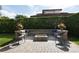 Inviting outdoor firepit and seating area, perfect for entertaining in your backyard at 8424 Lake Burden Cir, Windermere, FL 34786