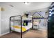 The ' bedroom features minion-themed decor with a bunk bed and large dresser at 8961 Cuban Palm Rd, Kissimmee, FL 34747
