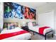 Charming bedroom featuring two twin beds and Star Wars themed decor for a fun, immersive experience at 8961 Cuban Palm Rd, Kissimmee, FL 34747