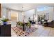 Inviting living space featuring a spacious layout, natural light, and stylish decor throughout at 8961 Cuban Palm Rd, Kissimmee, FL 34747