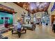 Lobby featuring an aquarium, wood ceilings, tile floors, attractive furniture and bright, airy lighting at 8961 Cuban Palm Rd, Kissimmee, FL 34747
