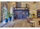 Beautiful lobby area with architectural details, potted plants, tile floors and attractive furniture at 8961 Cuban Palm Rd, Kissimmee, FL 34747