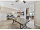 Welcoming entryway with wainscoting, wood-look tile, decorative console table, and open sight lines at 9192 Bradleigh Dr, Winter Garden, FL 34787