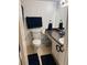 Well-lit bathroom with a vanity, sink, toilet, and wall mirror at 125 Water Front Way # 200, Altamonte Springs, FL 32701