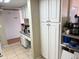 Functional kitchen with ample storage and a view into a dining area at 125 Water Front Way # 200, Altamonte Springs, FL 32701