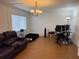 Inviting living room with an open floor plan and lots of natural light at 125 Water Front Way # 200, Altamonte Springs, FL 32701