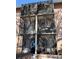 View of the back of the building with enclosed screened balconies at 125 Water Front Way # 200, Altamonte Springs, FL 32701