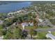 Aerial view showcasing the property's layout and proximity to the lake at 1300 Conrad Dr, New Smyrna Beach, FL 32168