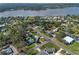 Scenic aerial view of the neighborhood with lake access and lush greenery at 1300 Conrad Dr, New Smyrna Beach, FL 32168