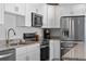 Kitchen featuring granite countertops and stainless appliances at 1300 Conrad Dr, New Smyrna Beach, FL 32168