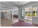 Spacious open-concept area with dining and kitchen visible from entryway at 1300 Conrad Dr, New Smyrna Beach, FL 32168