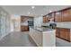 Spacious kitchen with granite countertops, stainless steel appliances, and a large center island at 1515 Angler Ave, Kissimmee, FL 34746