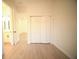 Bedroom featuring hardwood floors, a neutral paint palette, and a closet at 15215 Sw 43Rd Ct, Ocala, FL 34473