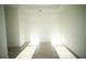 Neutral-colored room with light wood flooring and white walls, perfect for a home office at 15215 Sw 43Rd Ct, Ocala, FL 34473