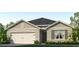 Charming single-story home with a two-car garage and manicured front lawn at 1705 Three Bars Rd, Kissimmee, FL 34744