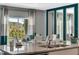 Dining area with large windows, modern furnishings, and stylish decor, great view of the outside at 1718 Three Bars Rd, Kissimmee, FL 34744