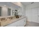 Bright bathroom with double vanity, granite countertops, and a shower at 1730 Three Bars Rd, Kissimmee, FL 34744