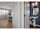 Charming powder room features a pedestal sink and stylish decor adjacent to the kitchen at 1832 Farnham Dr, Ocoee, FL 34761