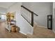 Entryway features a staircase and a console table with unique decor elements at 1832 Farnham Dr, Ocoee, FL 34761