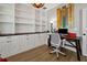 Bright home office with custom built-ins, a wooden desk, and stylish decor at 1832 Farnham Dr, Ocoee, FL 34761