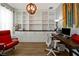 Bright home office with custom built-ins, a wooden desk, and stylish decor at 1832 Farnham Dr, Ocoee, FL 34761