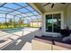 Inviting screened-in pool area with outdoor seating and a view of the lush backyard at 1832 Farnham Dr, Ocoee, FL 34761