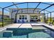 The screened-in patio and pool offer the perfect space for relaxation and entertainment at 1832 Farnham Dr, Ocoee, FL 34761