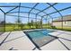 Sparkling screened-in pool offers a refreshing oasis for relaxation and outdoor enjoyment at 1832 Farnham Dr, Ocoee, FL 34761