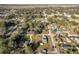 Picturesque aerial view of homes nestled among lush trees in a peaceful neighborhood at 200 Dr Martin Luther King Jr Se St, Fort Meade, FL 33841