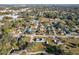 Scenic aerial view of a quiet neighborhood, showcasing tree-lined streets and well-spaced homes at 200 Dr Martin Luther King Jr Se St, Fort Meade, FL 33841