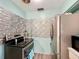 Modern kitchen featuring stainless steel appliances, a sleek black range, and stylish backsplash at 200 Dr Martin Luther King Jr Se St, Fort Meade, FL 33841
