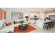 Bright living room with a modern kitchen, stylish decor, and ample seating for relaxing or entertaining at 2500 Penguin Blvd, Davenport, FL 33837