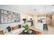Bright living room with a modern kitchen, stylish decor, and ample seating for relaxing or entertaining at 2500 Penguin Blvd, Davenport, FL 33837