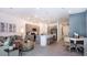 Open-concept living area and kitchen with stainless steel appliances at 2508 Penguin Blvd, Davenport, FL 33837