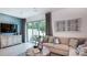 Comfortable living room showcasing stylish decor and a cozy seating area at 2508 Penguin Blvd, Davenport, FL 33837