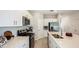 Well-equipped kitchen has modern appliances, a large island, and plenty of storage space at 2520 Penguin Blvd, Davenport, FL 33837