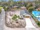 Bird's eye view of a single-Gathering home with new landscaping surrounded by expansive dirt lot at 281 Luis Ln, Debary, FL 32713