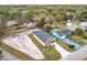 A charming single-story home features a well-manicured lawn, a long private driveway, and an attached one-car garage at 281 Luis Ln, Debary, FL 32713