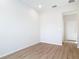 The bedroom includes wood-look flooring and neutral walls at 281 Luis Ln, Debary, FL 32713