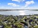 Stunning aerial view of the lakefront neighborhood showcasing the beautiful views at 340 W 9Th Ave, Mount Dora, FL 32757