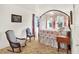 Bedroom with a canopy bed, windows and antique furnishings at 340 W 9Th Ave, Mount Dora, FL 32757