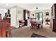 Dining room with a hutch, table with chairs, and neutral carpeting at 340 W 9Th Ave, Mount Dora, FL 32757