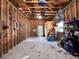 Spacious garage with exposed beams and ample storage space for all your tools and equipment at 340 W 9Th Ave, Mount Dora, FL 32757