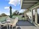 Lovely patio with stylish outdoor seating, perfect for relaxing and enjoying the beautiful weather at 340 W 9Th Ave, Mount Dora, FL 32757