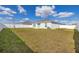 Large, fully fenced backyard with well-maintained lawn and minimal landscaping at 350 Rustic Rail Dr, Lake Wales, FL 33859