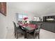 Dining room has a table with seating for six, an adjacent living room at 350 Rustic Rail Dr, Lake Wales, FL 33859
