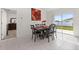Dining room has a sliding glass door and a table with six chairs at 350 Rustic Rail Dr, Lake Wales, FL 33859