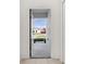 View from front entryway showing open front door and exterior view at 350 Rustic Rail Dr, Lake Wales, FL 33859