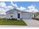 Charming single-Gathering home with a two-car garage, manicured lawn, and appealing curb appeal at 350 Rustic Rail Dr, Lake Wales, FL 33859